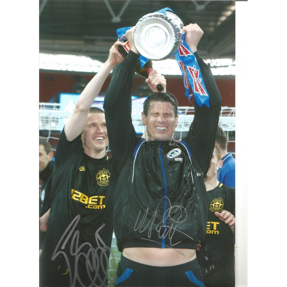 Gary Caldwell and Mike Pollitt Wigan Signed 10 x 8 inch football photo. Gary Caldwell and Mike Pollitt Wigan Signed 10 x 8 inch football photo.