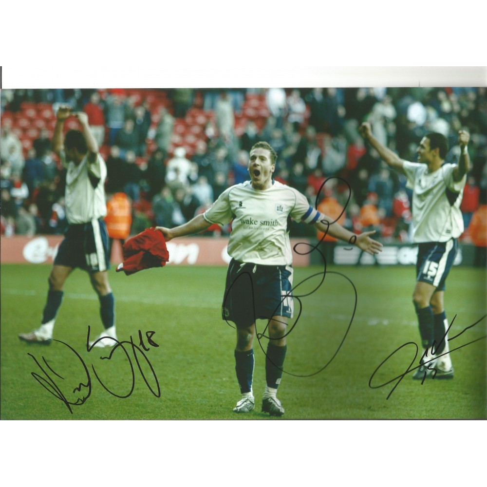 Multi Barnsley 12 x 8 colour photo signed by Howard, Da Silva & Souza. Multi Barnsley 12 x 8 colour photo signed by Howard, Da Silva & Souza.