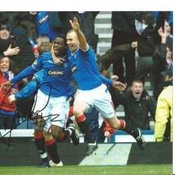 Maurice Edu Celtic goal Rangers Signed 10 x 8 inch football photo. Maurice Edu Celtic goal Rangers Signed 10 x 8 inch football photo.