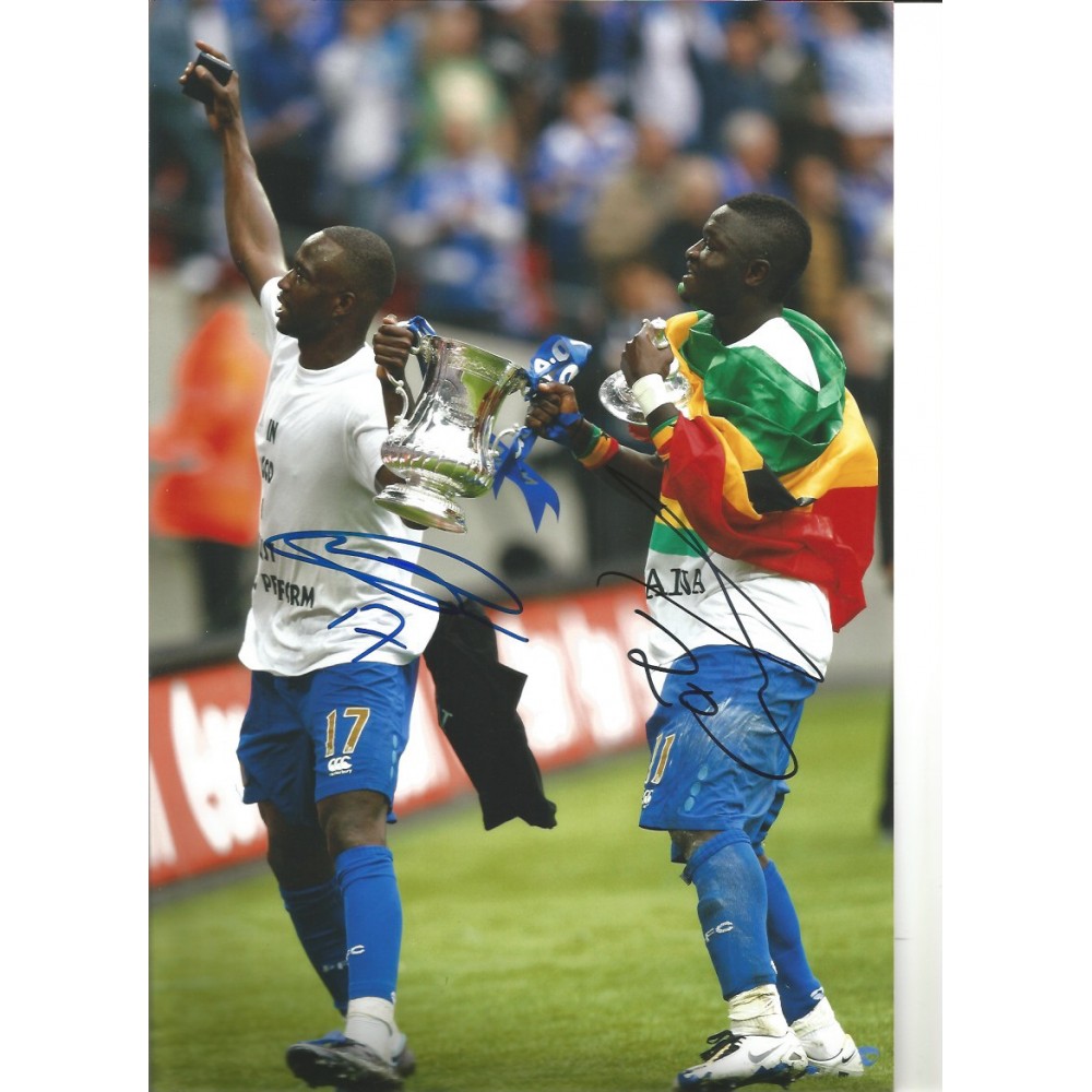John Utaka and Sulley Muntari Portsmouth Signed 12 x 8 inch football photo. John Utaka and Sulley Muntari Portsmouth Signed 12 x 8 inch football photo.