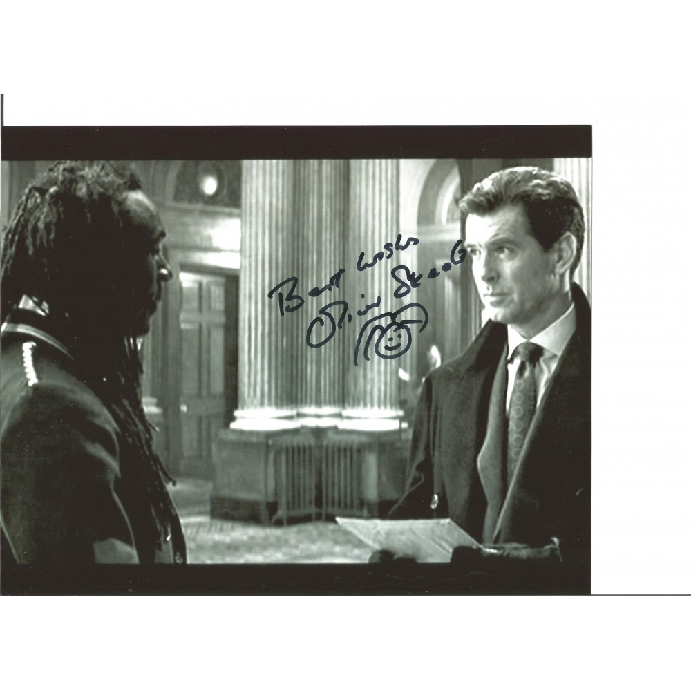 Show Jumper And Actor Oliver Skeete 10x8 Signed B/W Photo Pictured With Piers Brosnan Show Jumper And Actor Oliver Skeete 10x8 Signed B/W Photo Pictured With Piers Brosnan